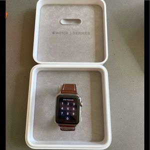 Hermès Apple Watch ( series 3, 38 mm). Box and charger included.